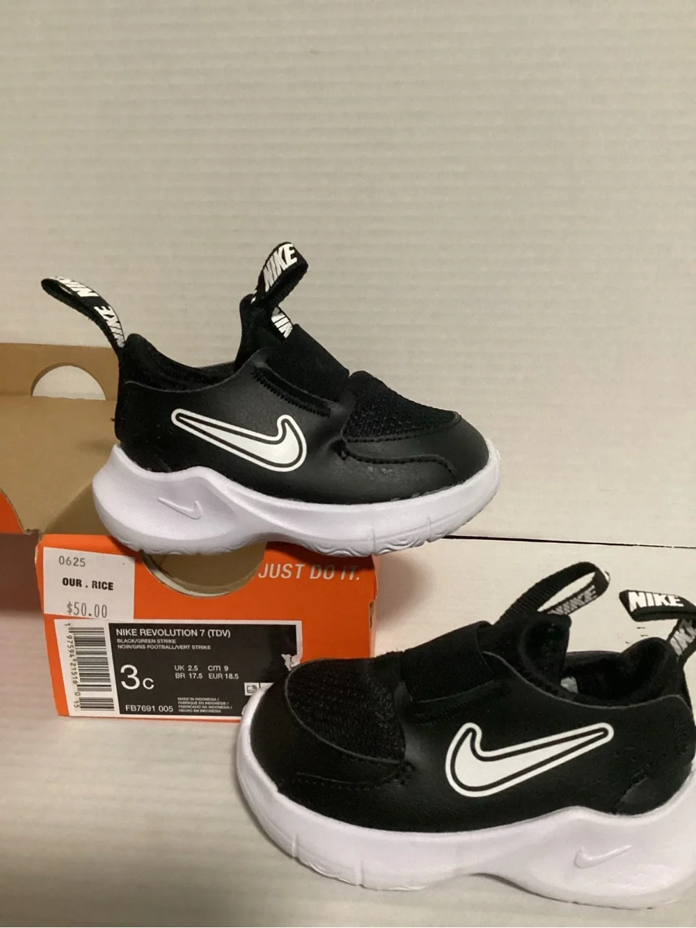Nike Baby 3c Black & White Slip-On Sneakers with Easy Pull Tabs